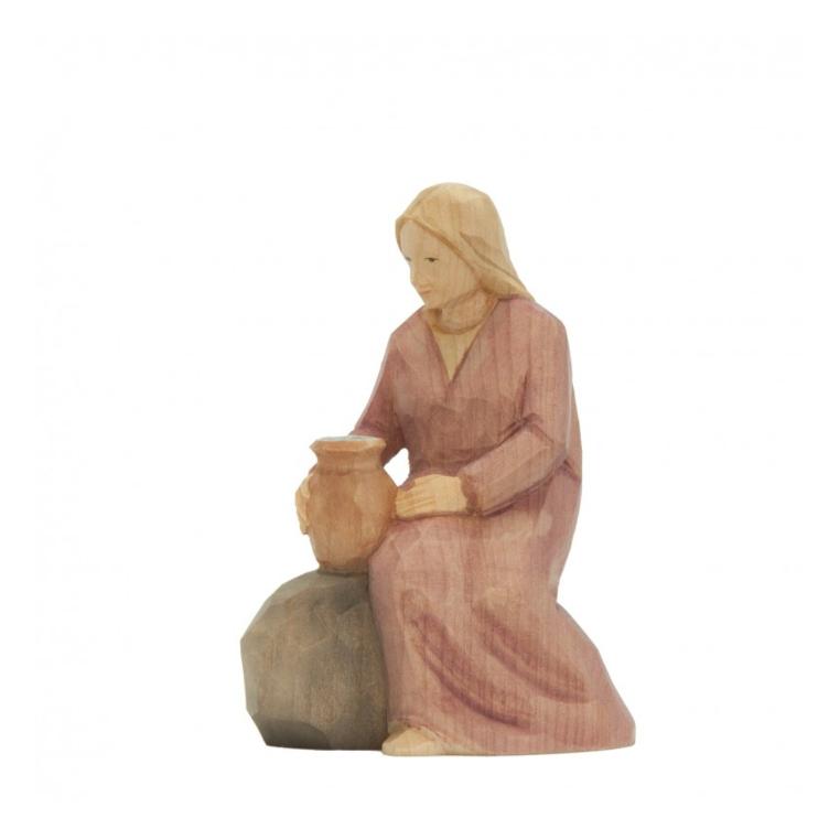 Femme sur pierre